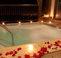 romantic hot tub at night