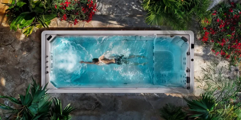 man swimming in swim spa